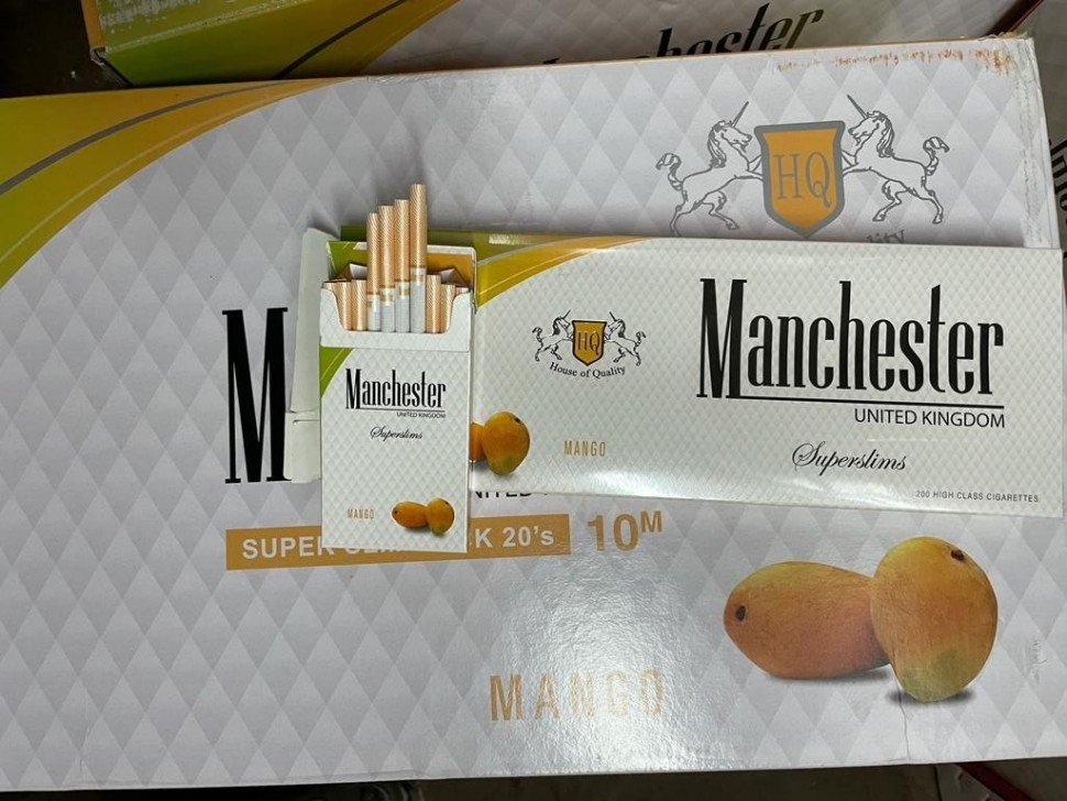 Сигареты Manchester Mango Superslims оптом Сигареты Manchester Mango Superslims оптом